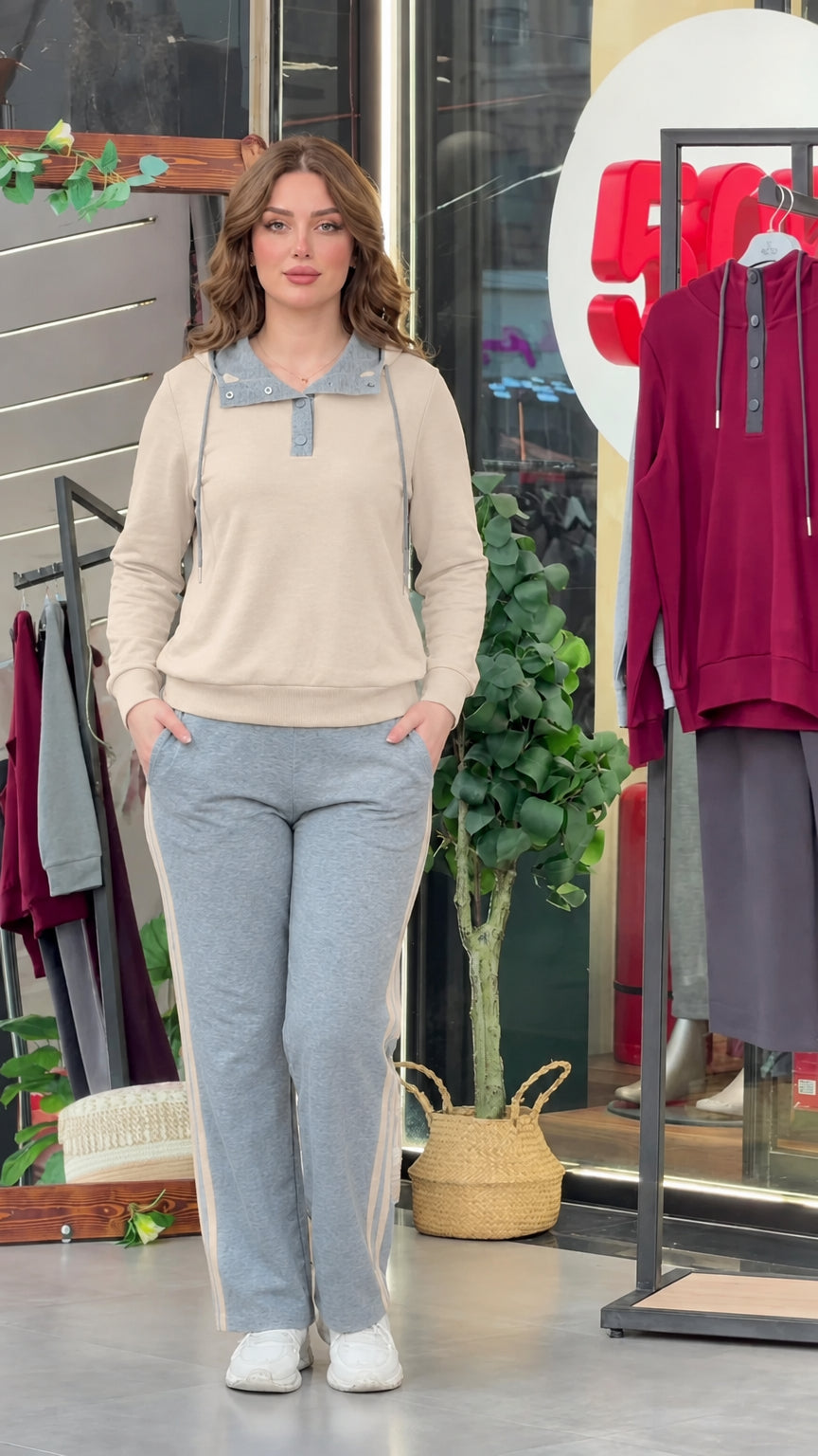 Model wearing beige long sleeve top with contrast grey collar and matching grey lounge pants