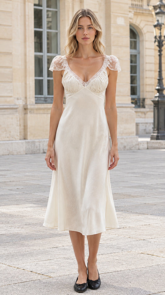 Front view of model wearing ivory lace cap sleeve satin midi dress