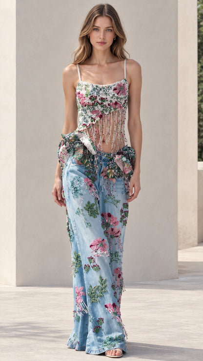 Light blue two-piece set featuring floral beaded cami with fringe and matching wide leg denim pants - front view