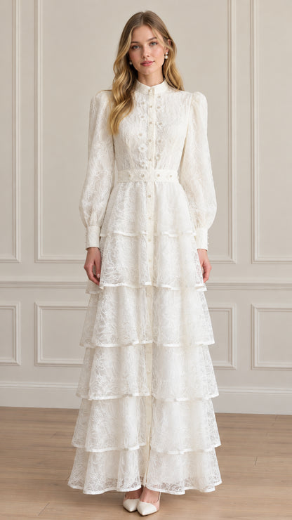 Full front view of model wearing white tiered lace high neck maxi dress with pearl accents