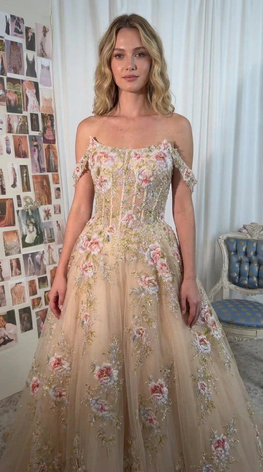 Front view of Champagne floral embroidered off-the-shoulder corset evening gown