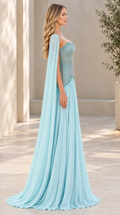 Side profile of Sky Blue beaded corset formal gown with flowing cape
