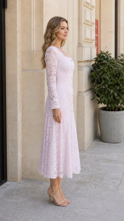 Side profile view of the blush pink floral lace A-line midi dress
