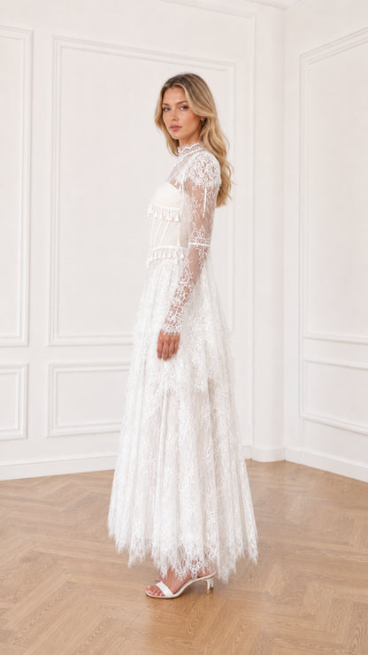 White lace evening gown with tiered skirt side view
