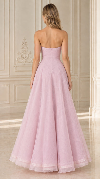 Back view of model in Blush Pink strapless floor-length formal dress