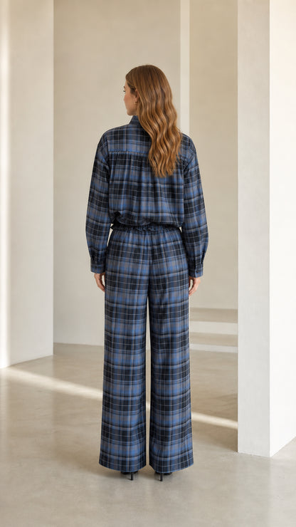 Back view of model showcasing the fit of the blue plaid two-piece coordinated set