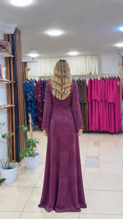 Back view of the plum jacquard dress featuring the lace-up detail