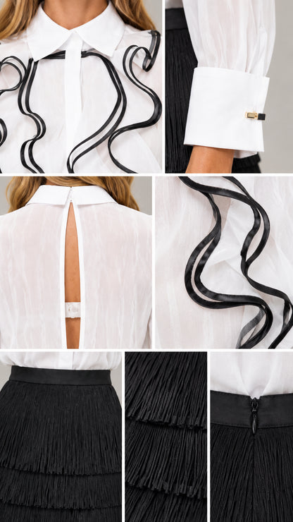 Close-up details of collar wavy trim, structured cuffs with hardware, back keyhole, and fringe fabric