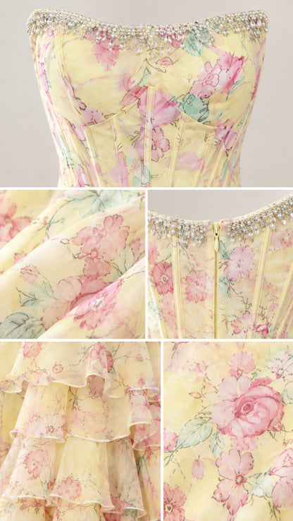 Close-up details of beaded neckline trim, boning, and ruffled floral chiffon fabric