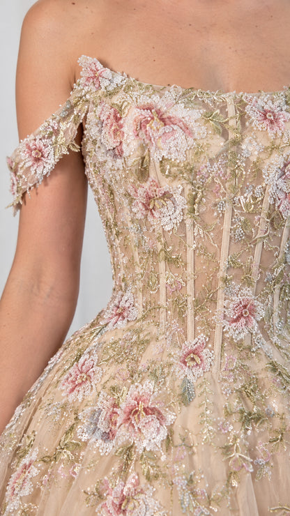 Close-up detail of embroidered corset bodice and off-shoulder straps