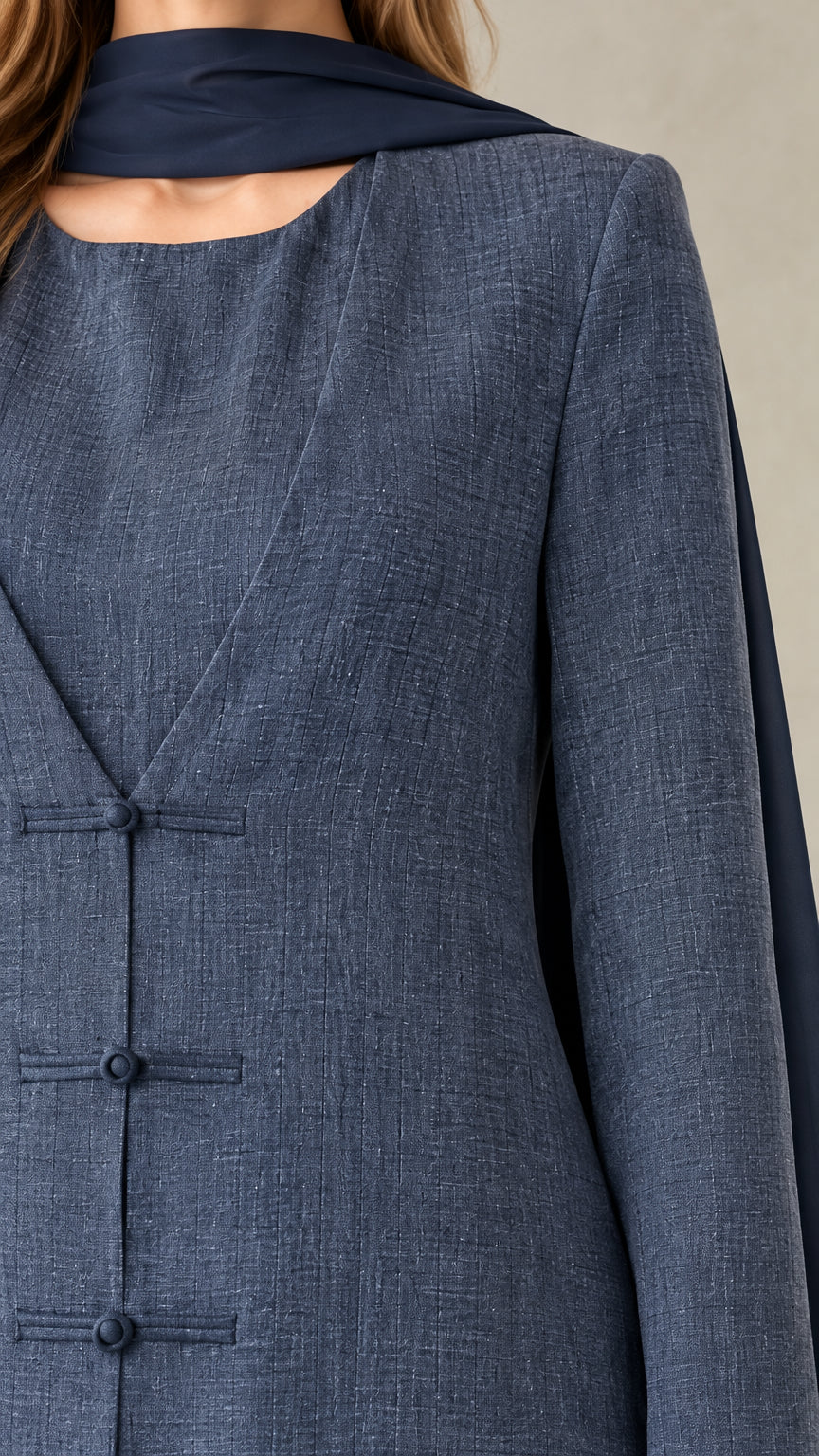 Close-up of Slate Blue textured weave and tailored frog knot loop closures