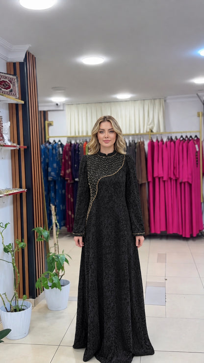 Full-length front view of the black jacquard evening maxi dress