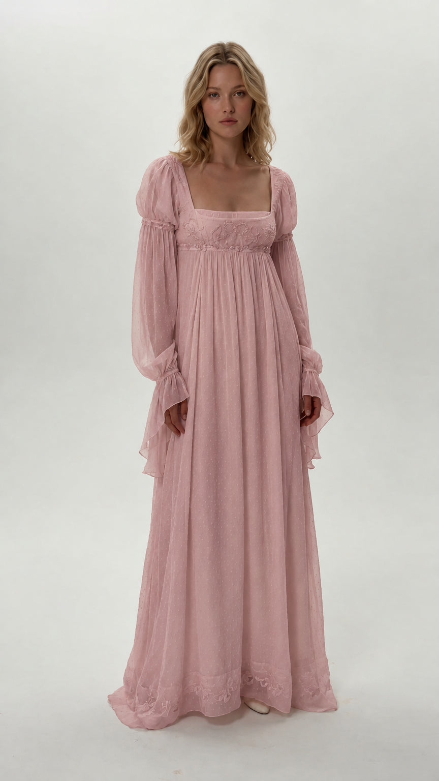 Front view of model wearing dusty pink empire waist chiffon maxi dress