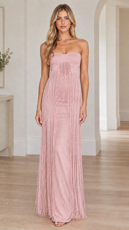 Full-length view of dusty rose strapless fringe maxi dress
