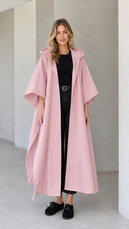 Model wearing dusty pink hooded maxi cape coat