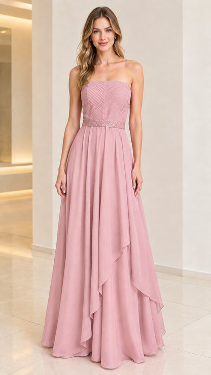 Front view of woman wearing dusty rose strapless bridesmaid maxi gown