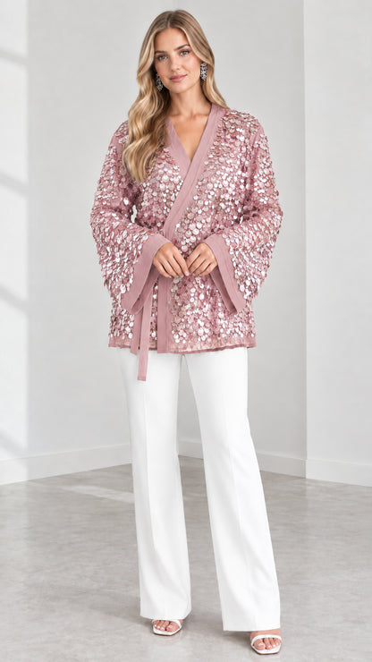 Model wearing Blush Pink sequin kimono wrap jacket with matching tie belt