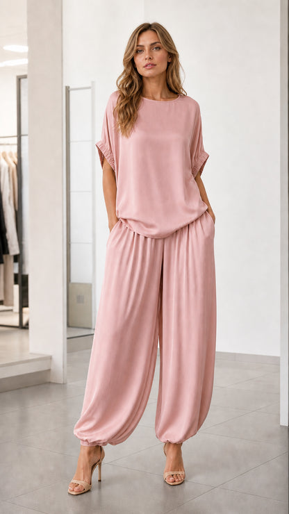 Front view of model wearing pink two-piece lounge set