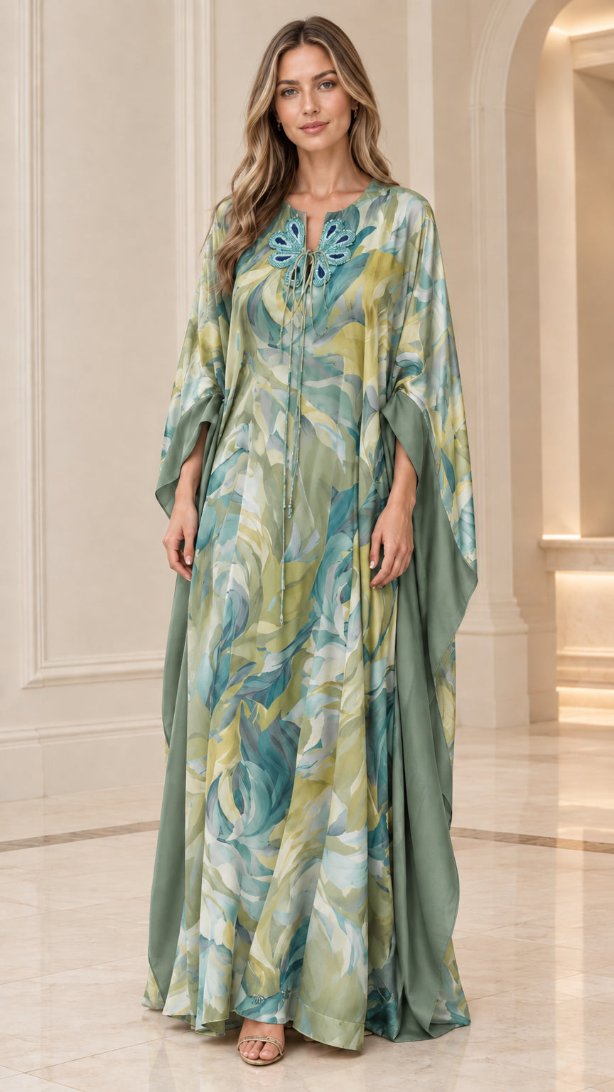 Full-length front view of sage green floral caftan maxi dress