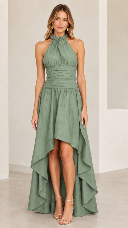 Model wearing sage green halter neck cascading high-low gown
