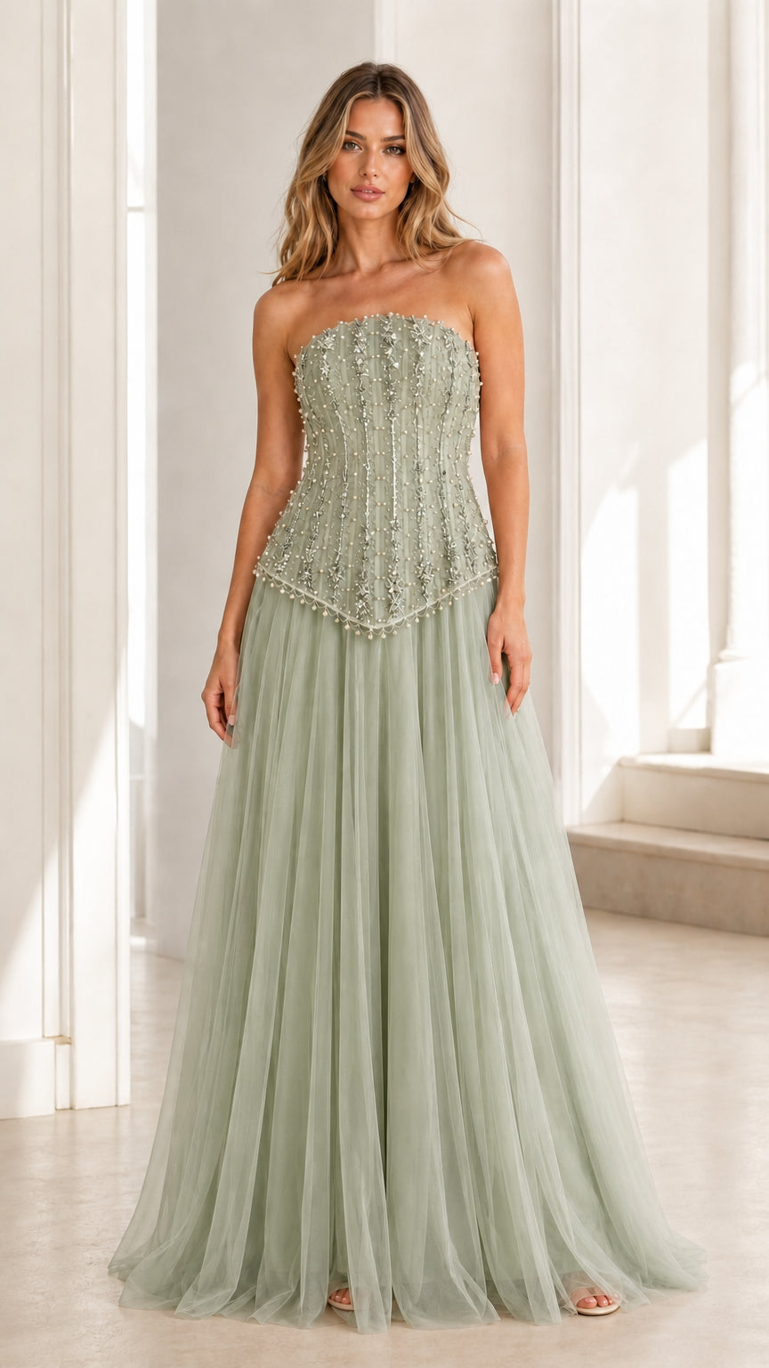 Front view of sage green embellished strapless tulle evening gown