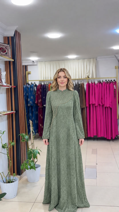 Full-length front view of the sage green jacquard formal dress