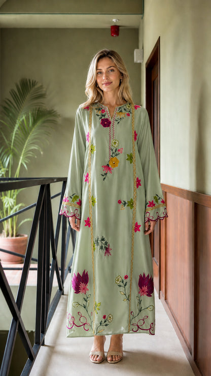 Model wearing Sage floral embroidered maxi kaftan dress
