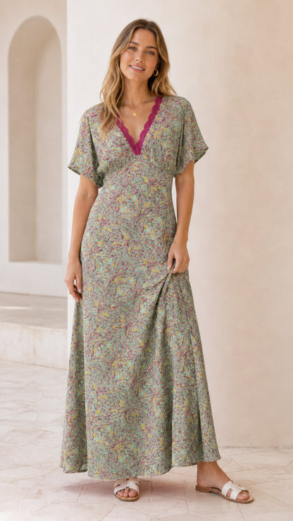 Front view of model wearing sage green floral lace trim maxi dress