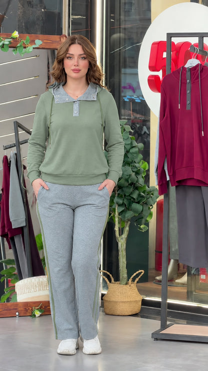Model wearing sage green long sleeve top with contrast grey collar and matching grey sweatpants