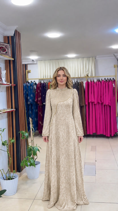 Full-length front view of the champagne gold jacquard maxi gown